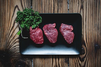 Raw beef steaks 