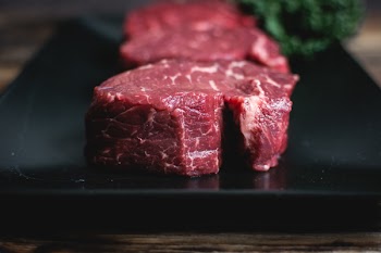 Raw beef steaks 