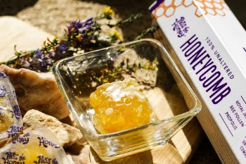 Raw honeycomb flatlay on a snack board 