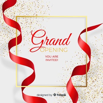 Realistic grand opening background with confetti Free Vector