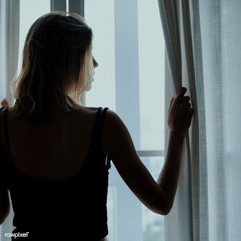Rear view of a woman standing by the window | Free  photo - 2330824