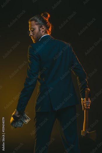 rear view of young man in tuxedo with ax and us dollar banknotes