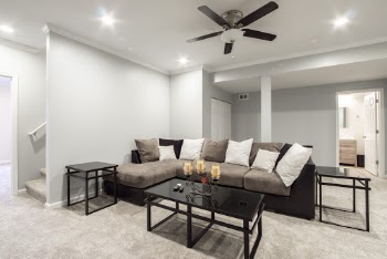 Rectangular Black Steel Center Table Near Chaise Couch