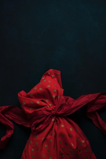 red and beige heart-printed cloth