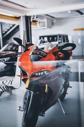 Red and Black Sports Bike Parking Inside Garage