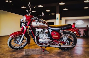 Red And Black Standard Motorcycle Parked Inside Room