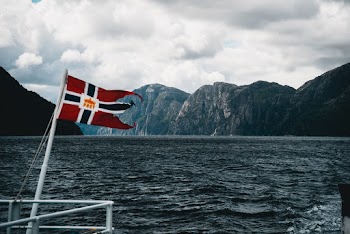 Red and Blue Flag on Boat