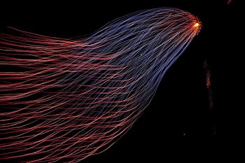 red and blue lights from tower steel wool photography