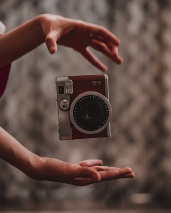 Red and Gray Fujifilm Instax Camera