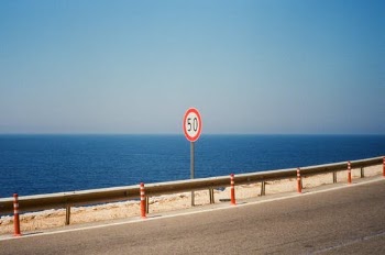 Red and White No Smoking Sign Near Sea · Free Stock Photo