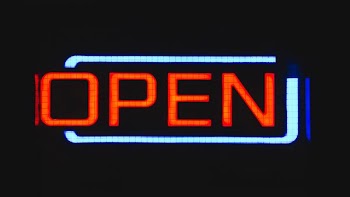 red and white open neon signage
