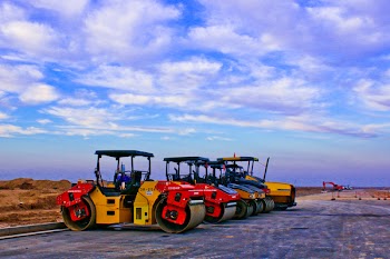 Red and Yellow Heavy Equipment at Daytime