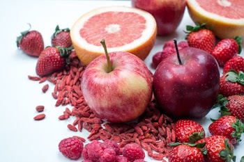 Red apples with other red fruit 