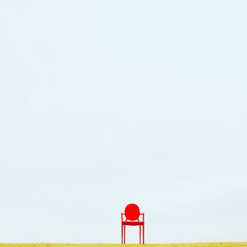 Red Armchair on Brown Surface · Free Stock Photo