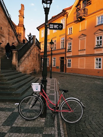 Red Bicycle Parked on Street