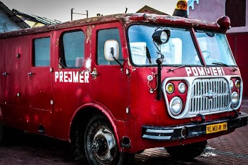 red car on parking lot