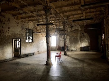 Red Chair Inside the Abandoned Building