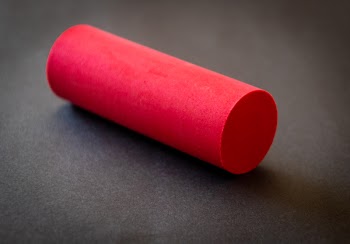 Red Chalk on Gray Surface