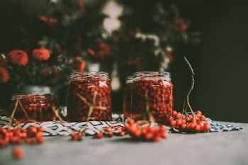 red cherries in jars