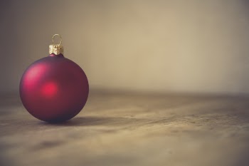 Red Christmas Bauble in Selective Focus Photography