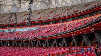 Red Colored Seats In An Arena
