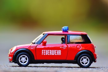 Red Diecast Mini Cooper Police Car