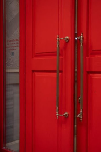 Red Double-Leaf Doors with Big Handles · Free Stock Photo