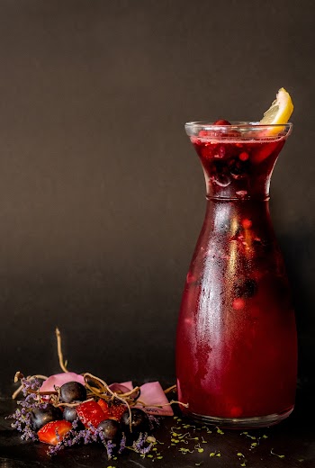 Red Drink In Glass Decanter