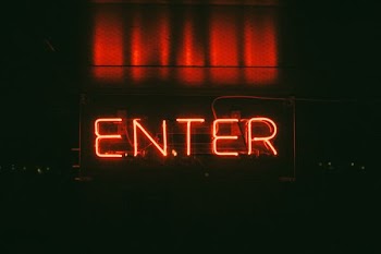 red Enter neon signage