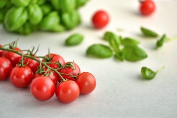 Red Fruit on White Surface