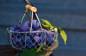 Red Grape Fruits on Metal Basket
