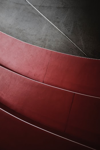 Red graphic staircase and concrete