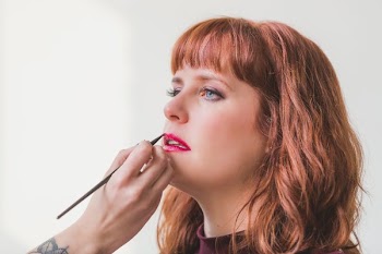 Red Haired Woman Getting Red Lips