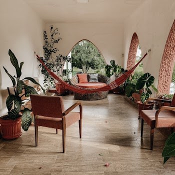 Red Hammock Between Wall