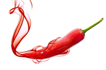 red hot chili pepper with smoke on white background. Traditional spicy and national food