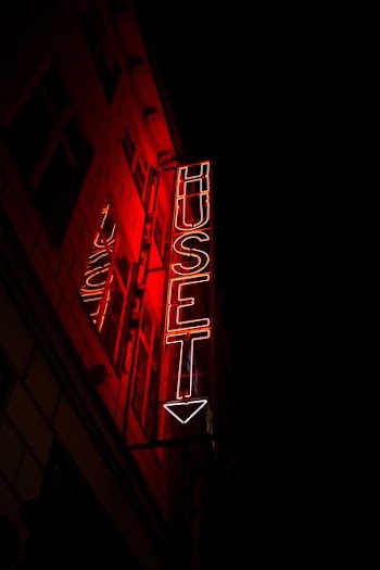 red lighted huset signage
