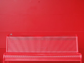 red metal bench