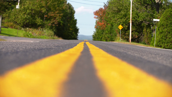 Red mustang car on a hilly road in North America. Stock Video ...