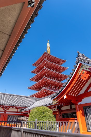Red Pagoda House Under Clear Blue Sky