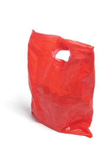Red Plastic Bag On White Background