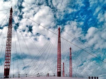 Red Power Lines Under White Clouds