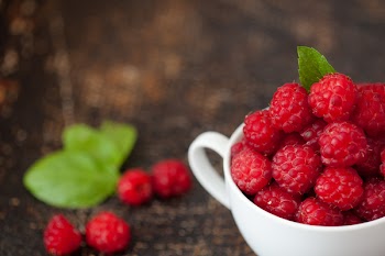 Red Raspberries in Mug