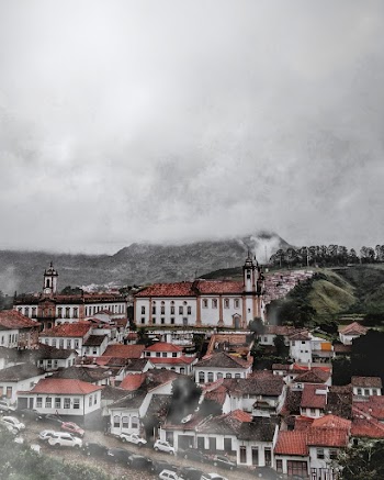 Red Roof Houses Under Cloudy Sky