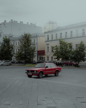 Red Sedan Parked