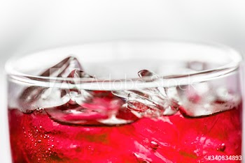 Red soda drink macro shot