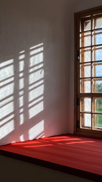 Red Table Beside the Glass Window · Free Stock Photo