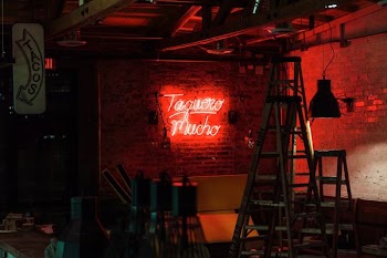 red taquero mucho neon signage