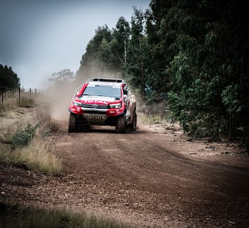 Red Toyota Vehicle On Rough Road