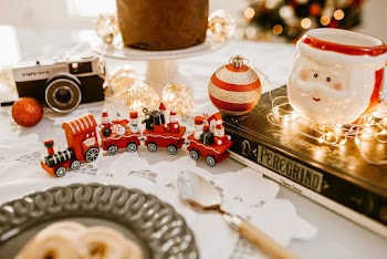 Red Train Toy Beside Christmas Decors