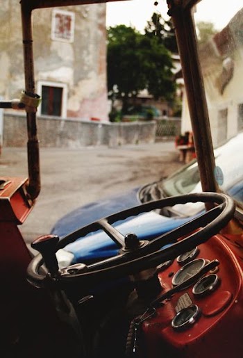 red vehicle on front of blue vehicle